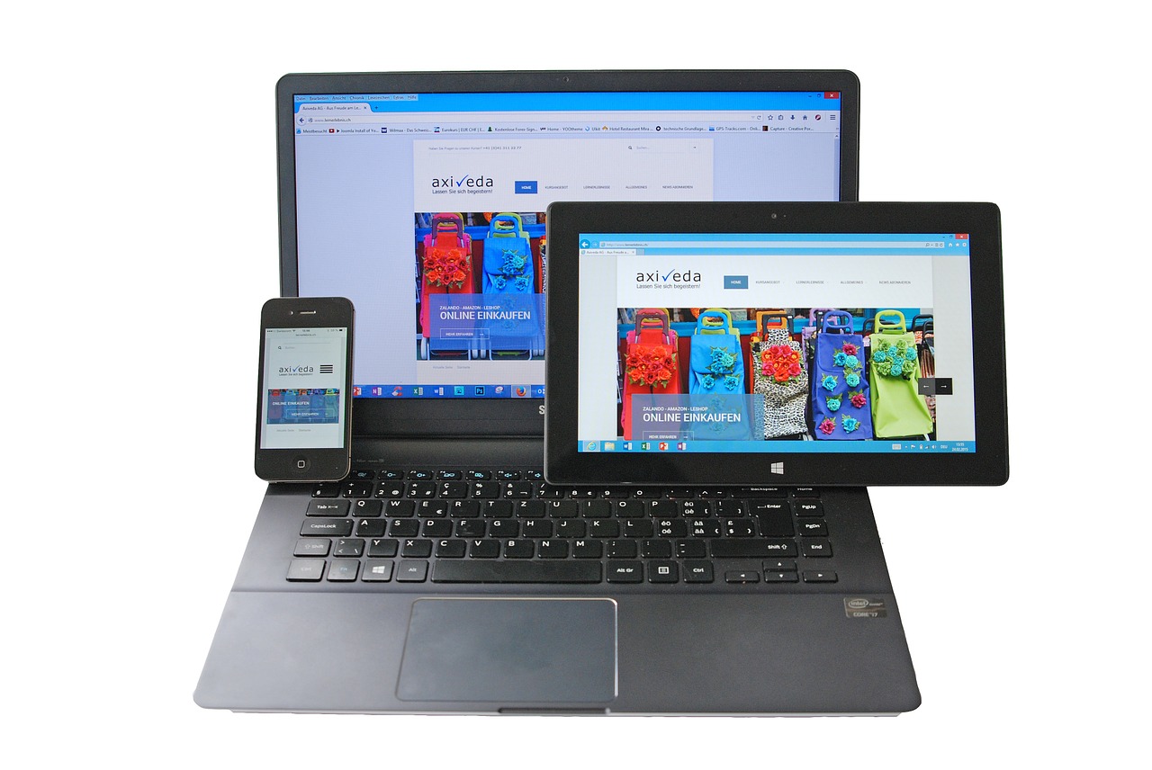 Image of mobile phone, tablet and laptop